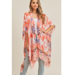 Women's Orange Patterned Kimono Top OS
NWOT